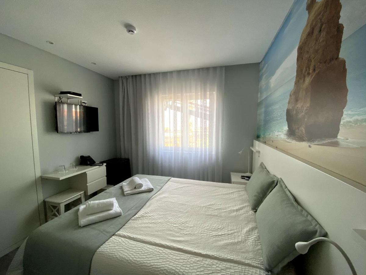 Golden Beach Guest House & Rooftop Bar ファロ エクステリア 写真