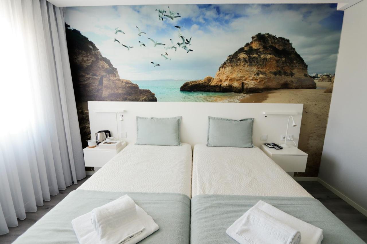 Golden Beach Guest House & Rooftop Bar ファロ エクステリア 写真